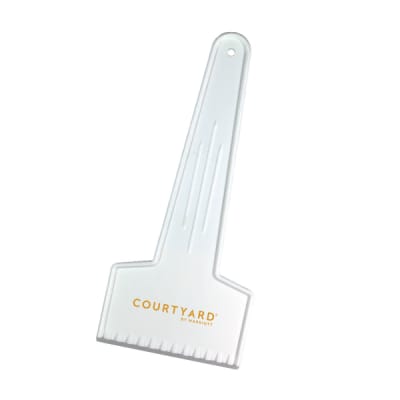 Ice scraper made of break-resistant plastic with Courtyard logo