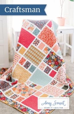 Craftsman Quilt Pattern by Amy Smart shows a bright quilt with different size  large rectangular patches in a large variety of fabrics.