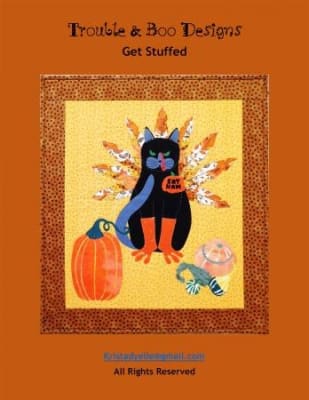 GET STUFFED Cat Quilt Pattern by Trouble & Boo shows a black cat in a turkey costume for Thanksgiving.