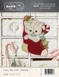 Socks the Kitty  Pattern from Buttermilk Basin shows a nostalgic pretty kitty in wool tucked into a Christma stocking!