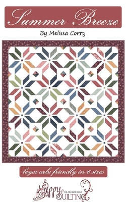 Summer Breeze Quilt Pattern by Melissa Corry shows a pretty quilt in scrappy colors with blocks that look like petals with a center square.
