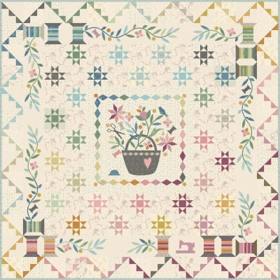 Sewing Basket Quilt Pattern by Laundry Basket Quilts shows a scrappy pieced and appliqued quilt in pastel colors on a variety of light cream background fabrics.