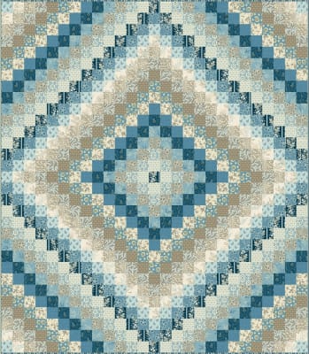 Trip Around the World Quilt Pattern in  Cocoa Blue  by Laundry Basket Quilts shows a traditional "trip around the world quilt set in tones of cream, blue and hot chocolate.