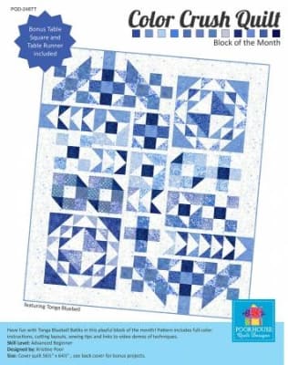 Color Crush BOTM Quilt Pattern by Poorhouse Quilt Designs shows a vibrant blue quilt featuring bluebell batiks from Timless Treasures.