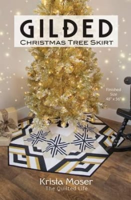 Gilded Christmas Tree Skirt Pattern  is a modern, graphic tree skirt shown in black and white, or on the flip side of the pattern, in red and green.