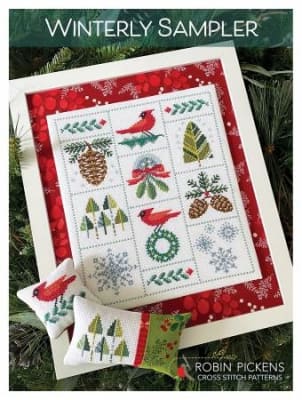 Winterly Sampler Cross Stitch Pattern by Robin Pickens shows a grove of pine trees in green on white.