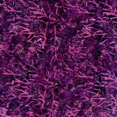 Plum Stamped Flowers On Branches # B1763-PLUM  from the Tonga Batik Sunset Collection shows a motif of flowers on tree branches in deep, dark tonal shades of purple.