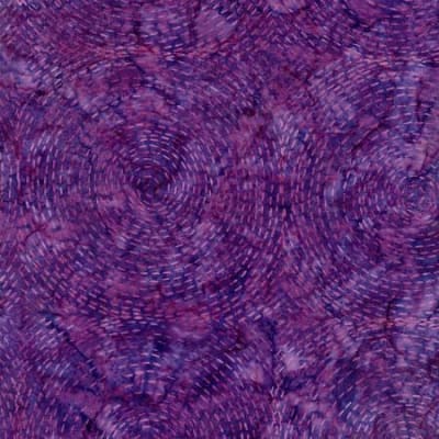 B3278-AMETHYST from the Tonga Batik Sunset Collection shows a  pattern of  spiral dots in shades of deep dark purple.