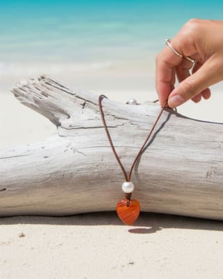 photo of Wendy Mignot Conch Shell Heart and Freshwater Pearl and Leather Love Saba Necklace