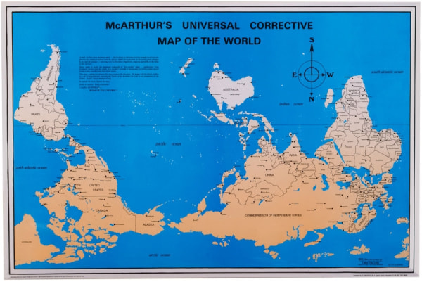 The original Upside-Down Map! Stuart McArthur's 23x35 South-Up World Map challenges Eurocentric bias by placing Australia on top. A powerful and famous cultural statement.
