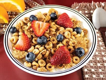 Five packets of cinnamon-o cereal in a box.