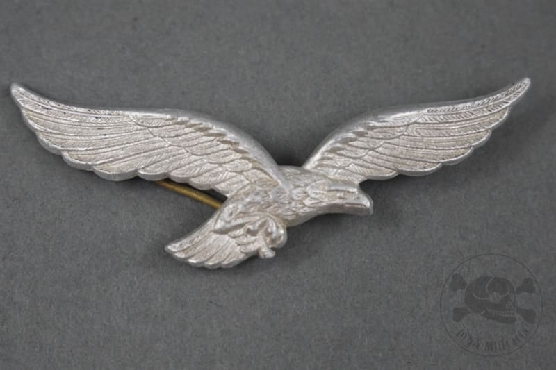 Original German WWII Luftwaffe 2nd Pattern Zinc Visor Cap Eagle Original German WWII Luftwaffe 2nd Pattern Zinc Visor Cap Eagle