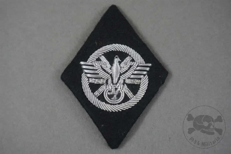 Unissued Original Waffen SS Sleeve Diamond For Former NSKK Officer With RZM Tag