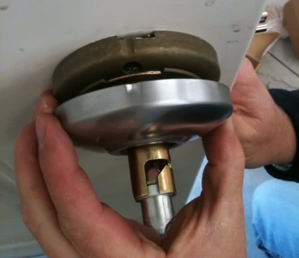 How to replace worn or damaged door handles on a hollow metal door
