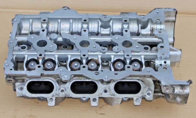 ENGINE CYLINDER HEAD LEFT