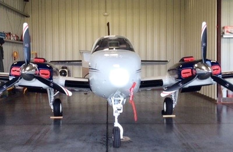 Cockpit heatshield installed inside Beech Baron 55, reflecting sunlight and reducing cabin heat.