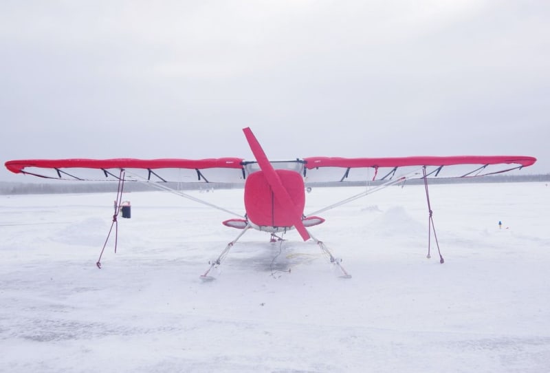 Cessna 120 parked on the ramp fitted with custom Bruceâ€™s Covers, showcasing full aircraft protection from sun and weather.