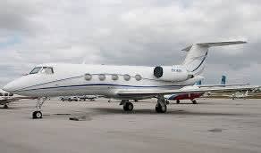 Gulfstream II/III (C-20D) aircraft covered with custom Silver Acrylic Sunbrella cockpit, engine, wing, and pitot covers for full protection against heat, frost, and environmental damage.
