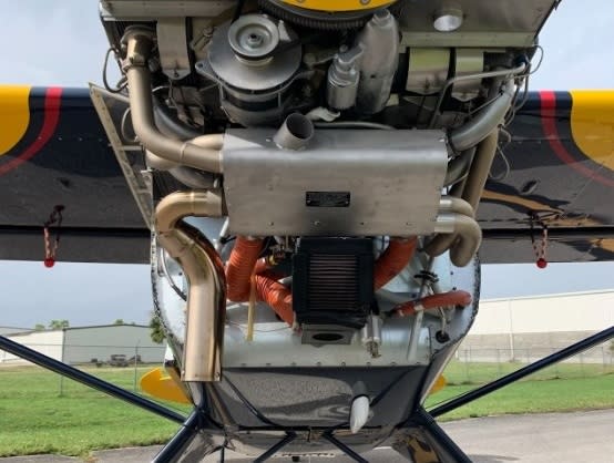 Aviat Husky 180HP aircraft equipped with Power Flow Tuned Exhaust system improving performance, climb, and cabin heat output.