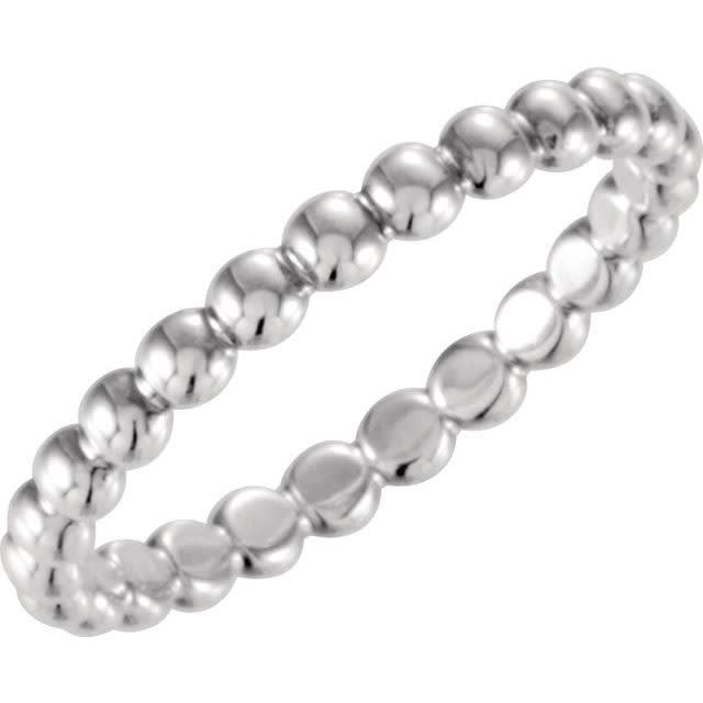 This beaded 14k stackable ring features delicate beads of gold woven together.