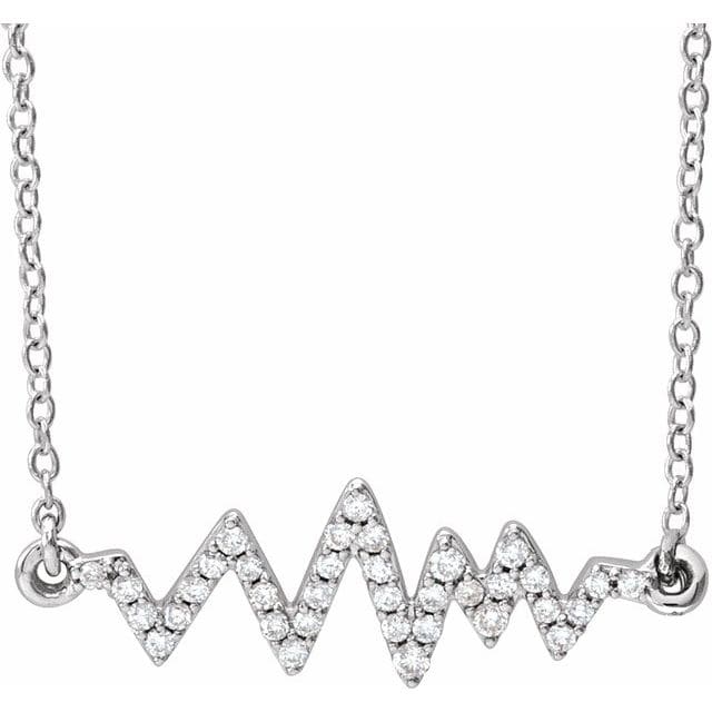 This heartbeat necklace features nearly one quarter carats of round diamonds.