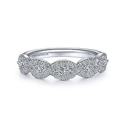 This 14k white gold diamond wedding ring features over one half carat of marquise and round diamonds.