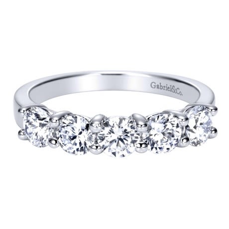 Diamonds and 14k white gold form a perfect partnership, mirroring you and your partner's! Featured with 5 round diamonds with a total diamond weight of 1.25 carats in this traditional diamond wedding band. Diamonds and 14k white gold form a perfect partnership, mirroring you and your partner's! Featured with 5 round diamonds with a total diamond weight of 1.25 carats in this traditional diamond wedding band.