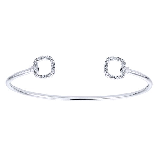 Two diamond squares wrap around your wrist in 14k white gold in this diamond studded open diamond cuff.