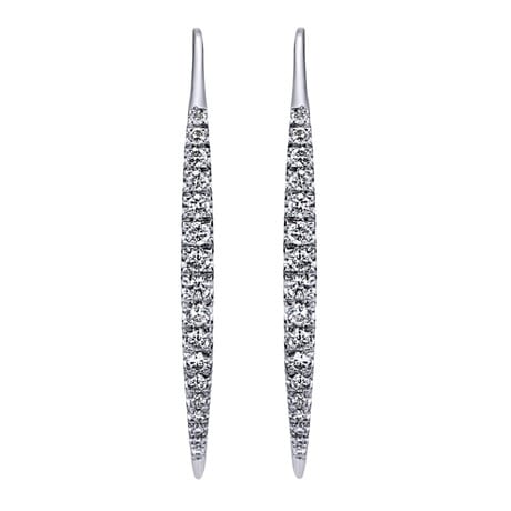 These drop earrings in 14k white gold shimmer with one half carat of round diamond brilliance, from the dagger shape to the funky way they are secured, this pair of trendy earrings has it all.