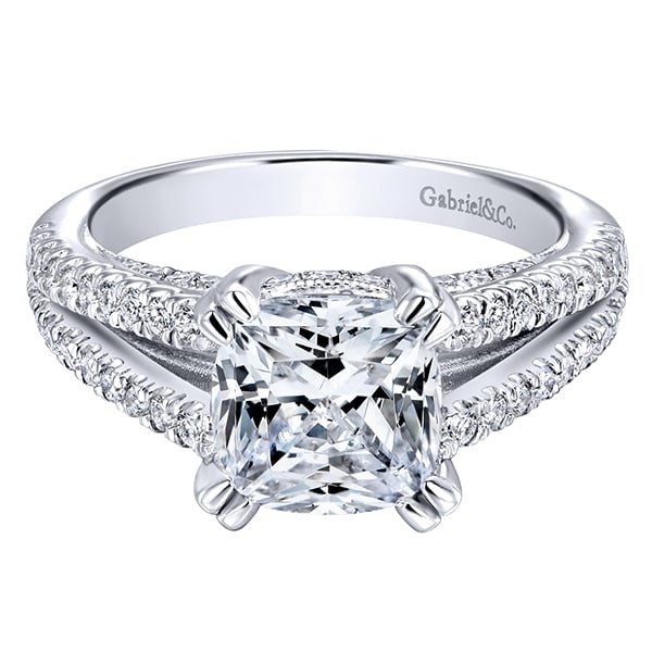 This fabulous cushion cut split shank diamond engagement ring is chock full of round brilliant diamonds with 2/3 carats of shimmering radiance! This fabulous cushion cut split shank diamond engagement ring is chock full of round brilliant diamonds with 2/3 carats of shimmering radiance!