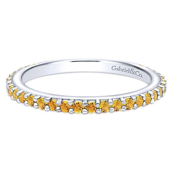 This 14k white gold stackable ring features citrine stones.