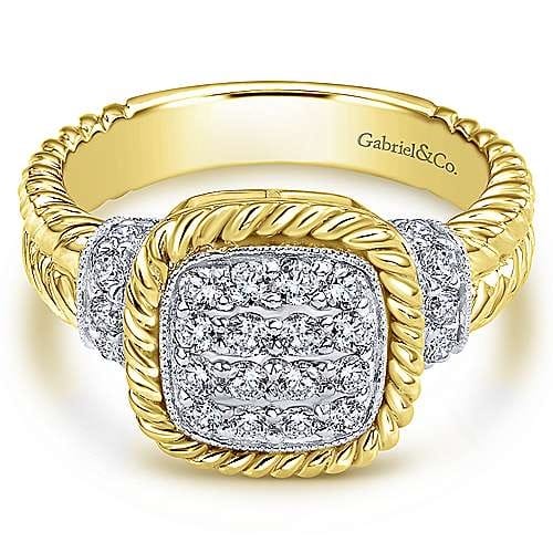 This yellow and white gold diamond ring contains one half carats in round brilliant diamonds all set around the center of this diamond rope ring. This yellow and white gold diamond ring contains one half carats in round brilliant diamonds all set around the center of this diamond rope ring.