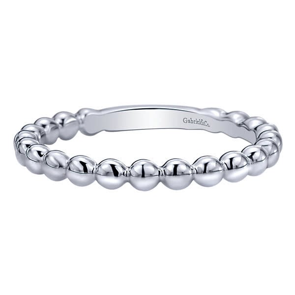 This simple and cool beaded stack ring comes in 14k white gold and teams up well with others!