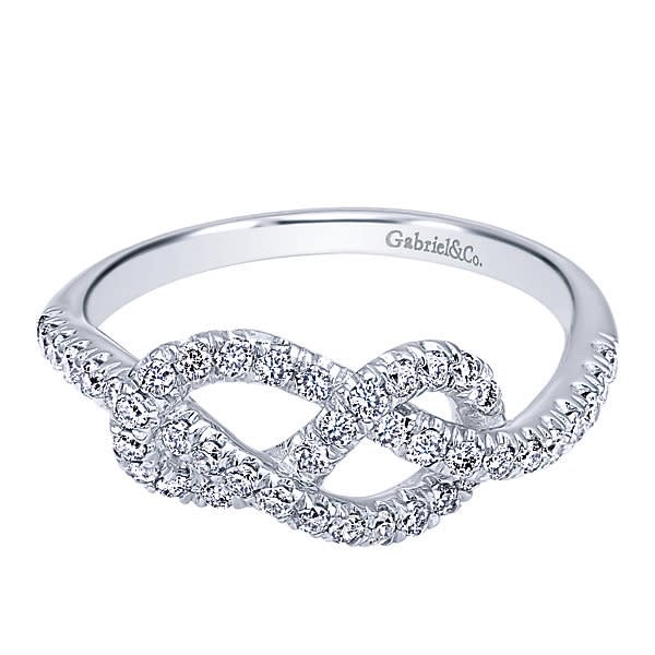 This looping masterpiece features 0.40 carats of round brilliant diamonds in a well designed knot in this 14k white gold. This looping masterpiece features 0.40 carats of round brilliant diamonds in a well designed knot in this 14k white gold.