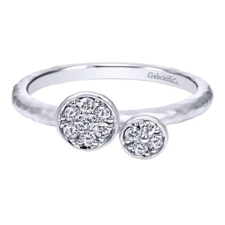 Diamond clusters float suspended over 14k white gold in this whimsical 14k white gold diamond cluster ring. Diamond clusters float suspended over 14k white gold in this whimsical 14k white gold diamond cluster ring.