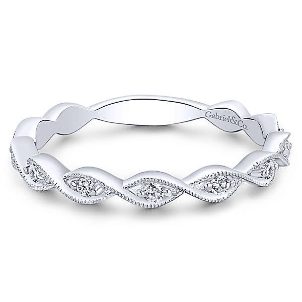 This 14k white gold diamond stackable ring features milgrain twists.