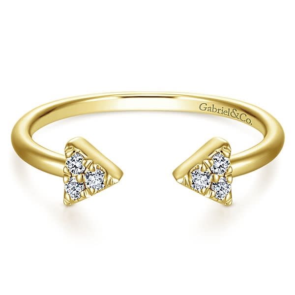 This 14k yellow gold diamond triangle stackable ring features diamond accents.