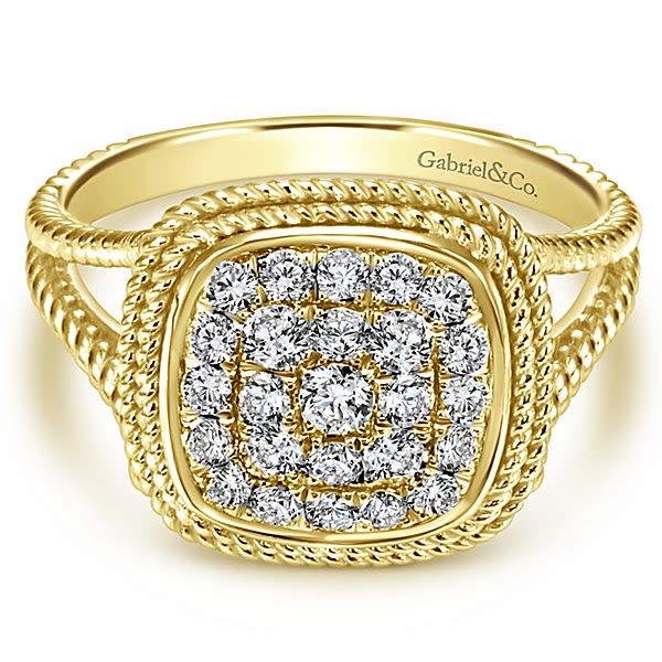 This elegantly styled 14k yellow gold diamond ring boasts one half carats of shimmering diamonds gathered together in a cluster setting..