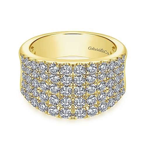 This 14k yellow gold wide diamond band features nearly 2 carats of round brilliant diamonds.