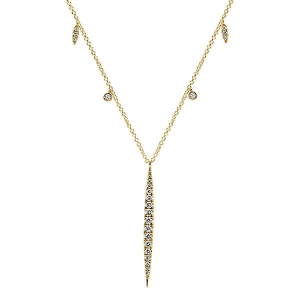 Round brilliant diamonds drip from this half station half pendant 14k yellow gold diamond necklace.