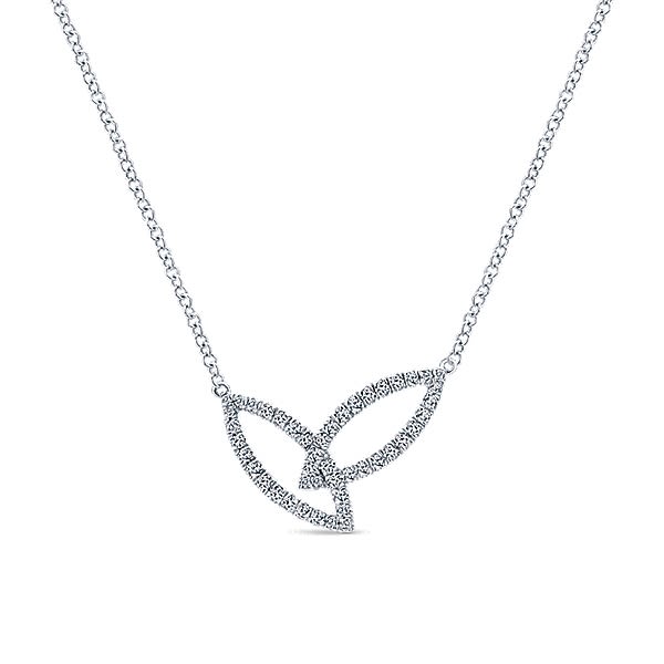 Round brilliant diamonds shimmer in two distinct diamond sections all set into 14k white gold in this necklace.