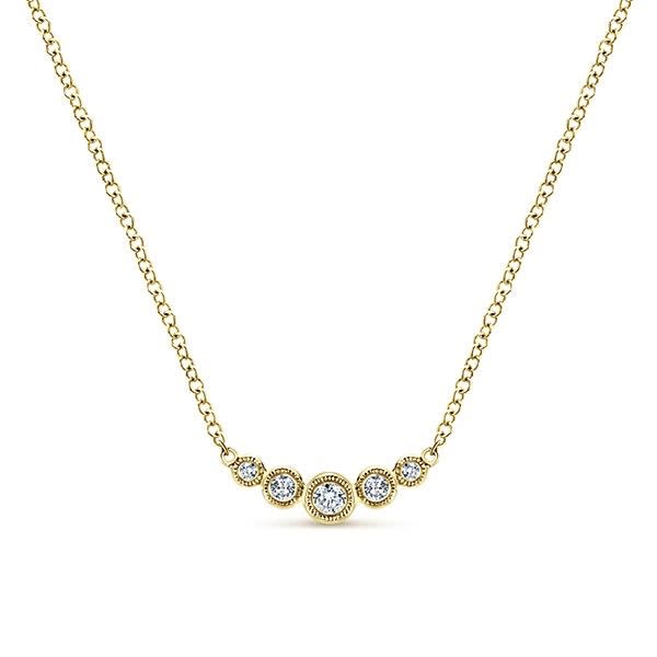 0.10 carats of round brilliant diamonds in a bar and bezel setting necklace.