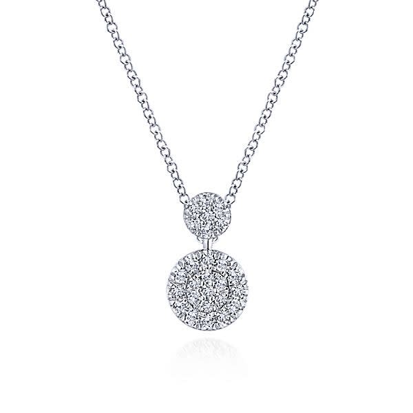 This 14k white gold diamond necklace showcases two diamond disc sections.