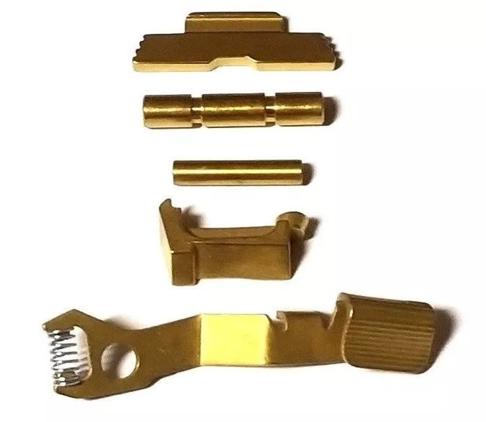 TANGO DOWN VICKERS Tactical Slide Release, TiN Coated For Glock G42 43 TANGO DOWN VICKERS Tactical Slide Release, TiN Coated For Glock G42 43
