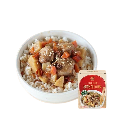 Room temperature vegan Sichuan beef rice bowl with savory sauce and vegetables.