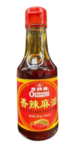 Vegan Sesame Oil Spicy, infused with a kick of heat, perfect for adding bold flavor to stir-fries, dressings, and marinades