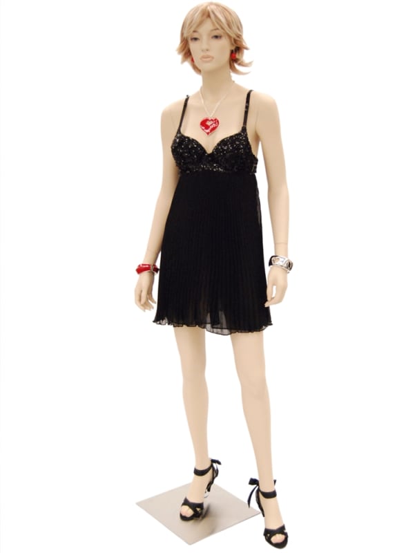Suze female mannequin in a natural fleshtone finish with realistic facial features and a sturdy metal base.