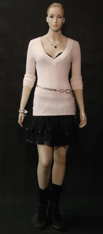 Artria professional female mannequin in natural fleshtone finish on a stable chrome base for retail display.
