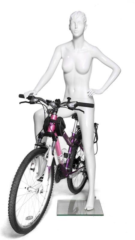 Female cyclist bike riding mannequin in glossy white resting pose for athletic apparel and cycling retail display