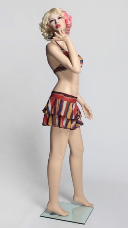 Realistic Marilyn female flesh tone mannequin in kiss pose for fashion retail displays
